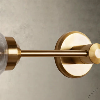 LUMENS LAMP Arrow 双头壁灯，采用黄铜饰面钢材，配有透明玻璃灯罩，设计简约现代，可水平或垂直安装。