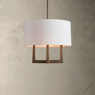 LUMENS LAMP Emmet 吊灯，采用做旧黄铜饰面和白色亚麻灯罩，呈现出独特的十字交叉轮廓设计。