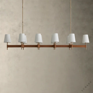 LUMENS LAMP Hastings 线性吊灯，采用古铜色黄铜底座、棕色皮革缝线细节和白色亚麻灯罩，设计优雅。