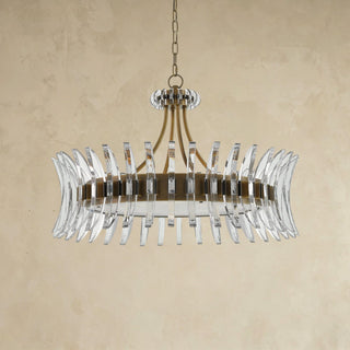 LUMENS LAMP Coquette 吊灯，采用古董黄铜饰面和半月形光学水晶叶片，呈现现代装饰艺术风格。