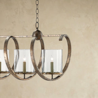 LUMENS LAMP Maximus Grande 吊灯，采用黄铁矿青铜饰面锻铁螺旋框架和透明玻璃灯罩，设计优雅。