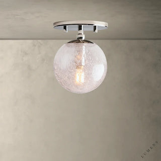LUMENS LAMP Mandoza 嵌入式吸顶灯，带有手工吹制气泡玻璃球罩和抛光镍饰面，呈现工业与乡村风格。